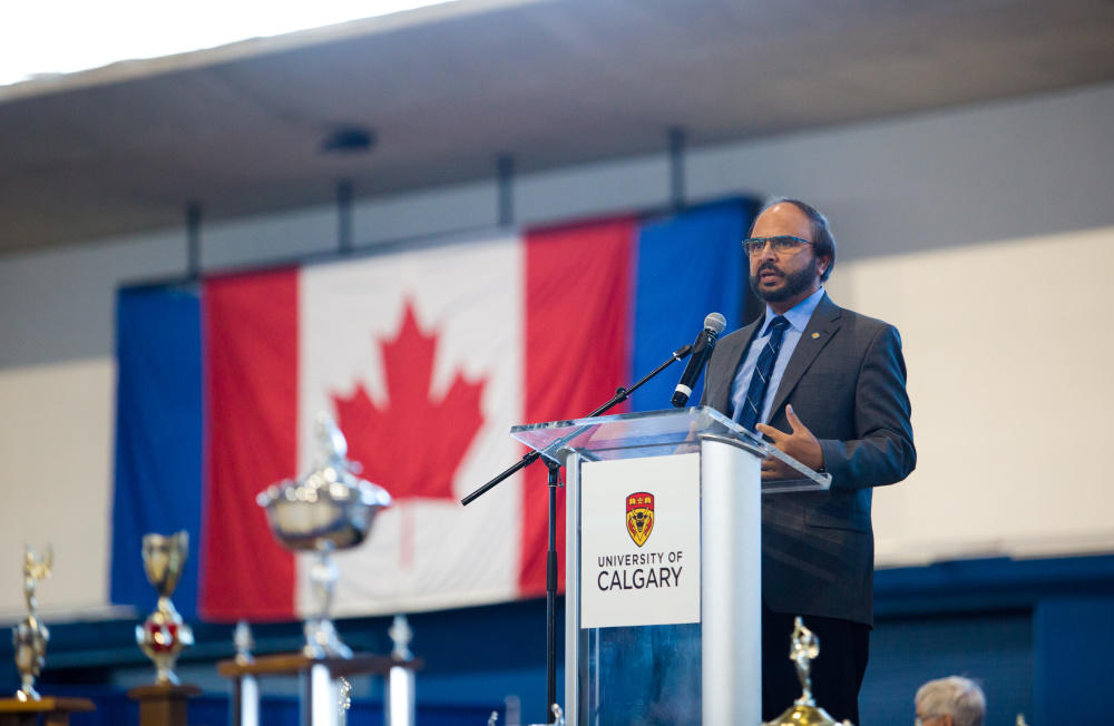 Naweed Sayed offers Calgary Youth Science Fair participants some encouraging advice.