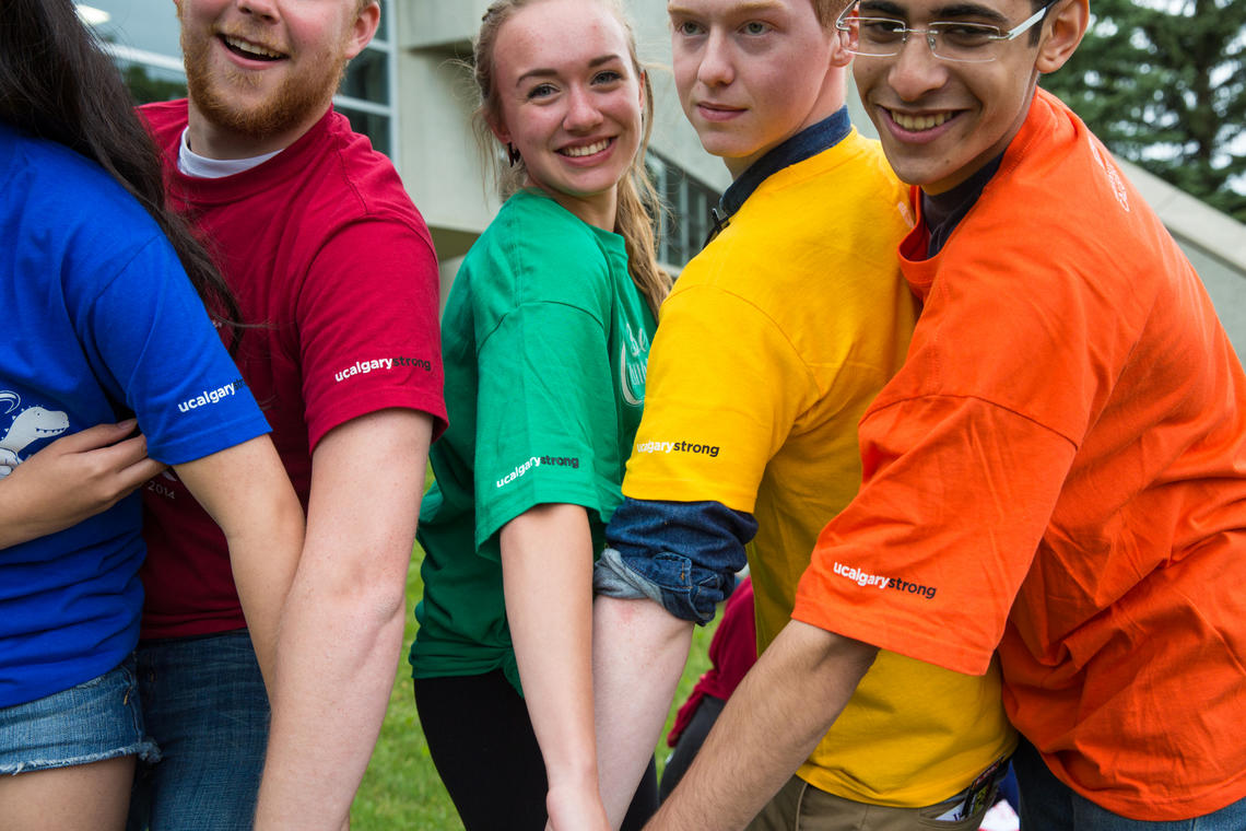 Students taking part in Orientation Week model their new T-shirts bearing the UCalgaryStrong brand.
