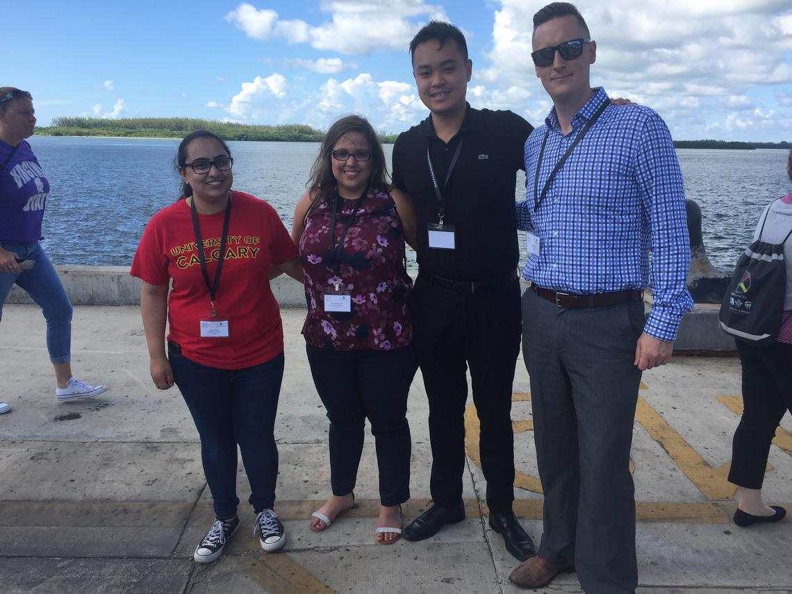 Haskayne instructor Leighton Wilks, far right, poses with Haskayne BComm students at last year's X-Culture Global Symposium in Miami, Fla.