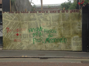 Graffiti in Belfast, written in English and Gaelic.