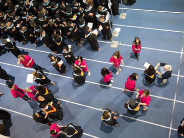 Graduating students, family members, and university leaders take part in convocation ceremonies at the University of Calgary in June 2019.