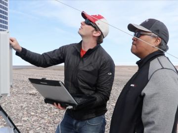Else working with community members to set up weather stations in Cambridge Bay