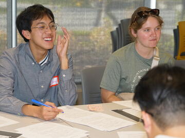 Student laughing doing activity