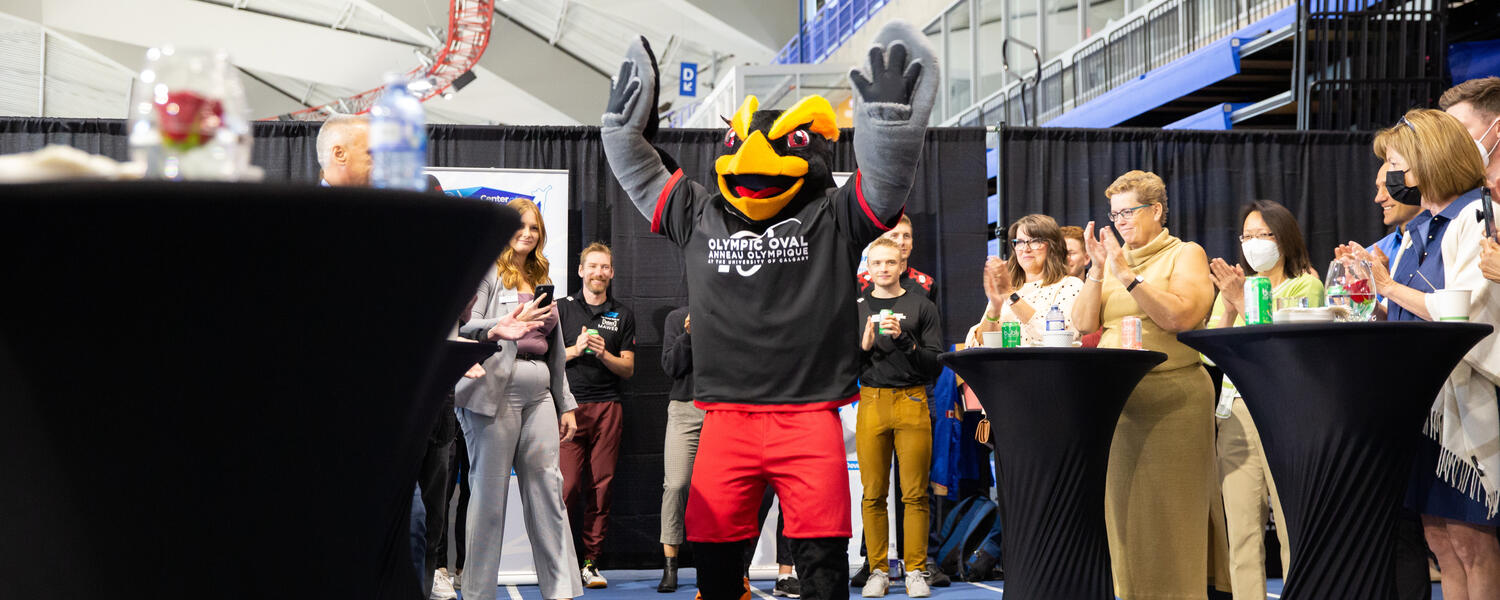 A photo of Kumi being celebrated at the Oval with his hands held up.