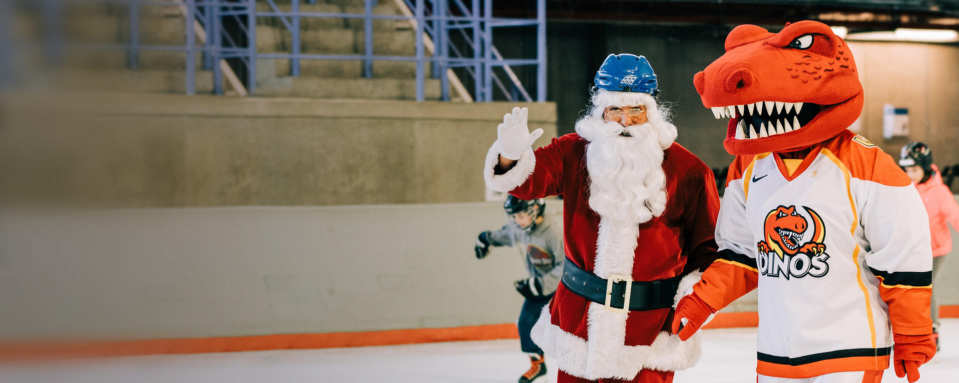 Santa and Rex skating together 