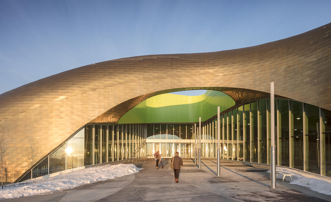 The undulating copper-tiled roof at the Shane Homes YMCA at Rocky Ridge was conceived by GEC Architecture
