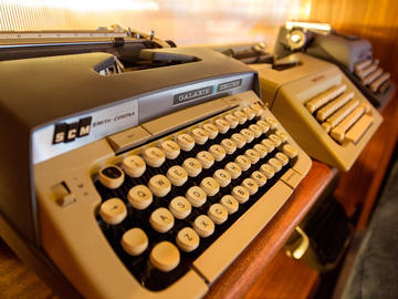 McKinley Burkart believes every detail — like these old-school typewriters at The Wednesday Room — contribute to the atmosphere of a space.