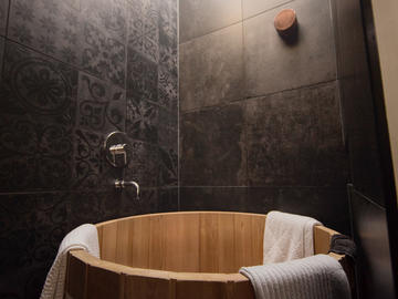 A Japanese soaking tub in another bathroom.