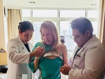 Russell receives treatment and takes her first steps in Semitivej Sukumvit Hospital, Bangkok.