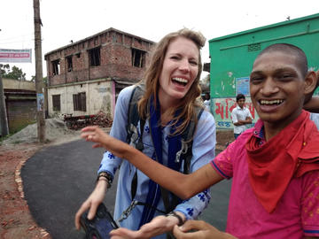 Russell shares a laugh with Rifat Hassan after a cricket match