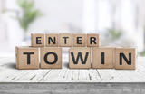 Blocks that have black letters on it saying "enter to win"