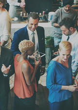 Group of young professionals at a networking event