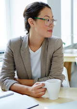 professional woman drinking coffee