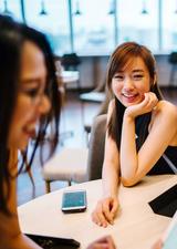 young woman interacting with friends