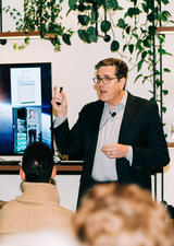 professional man giving a lecture