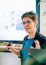professional woman giving a lecture