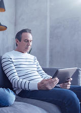 child and father having screen time