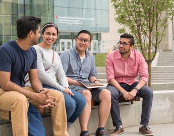 a group of individuals on the UCalgary campus