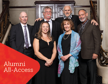 A photo of last year's Hall of Fame inductees standing on a stairwell 